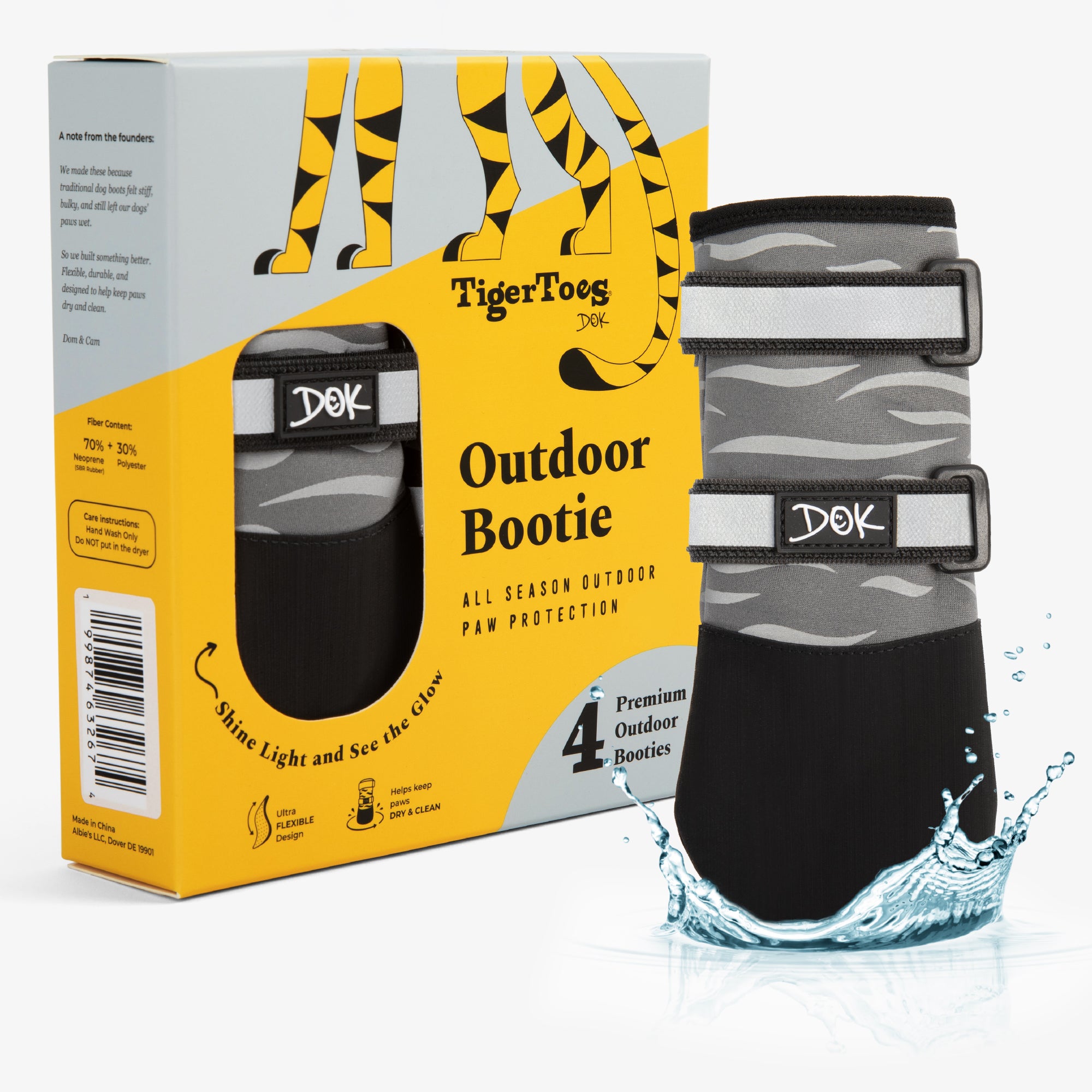 DOK TigerToes Outdoor Bootie all season outdoor paw protection boots shown next to their yellow and gray retail packaging box, with a water splash graphic at the base.